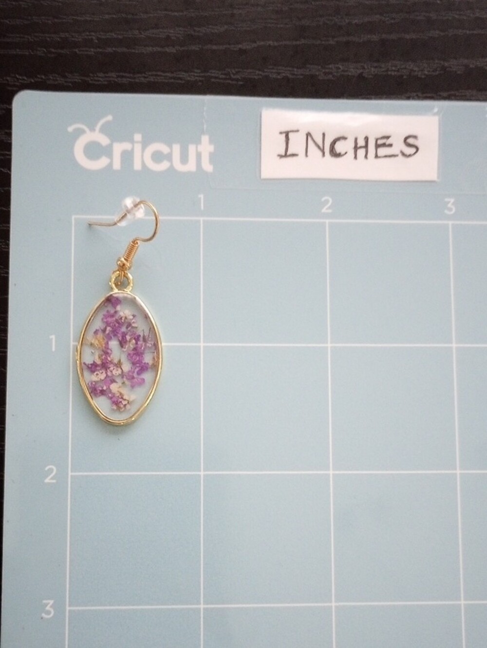 Golden Oval Floral Resin Dangle Earrings with Purple Flowers Inlay - Picture 2 of 2